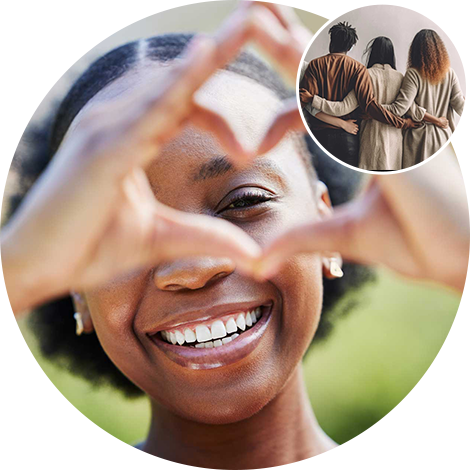 Main photo: A girl smiles in a photograph while holding up a heart symbol with her hands.